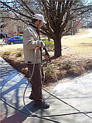 College Park Power washing a home driveway